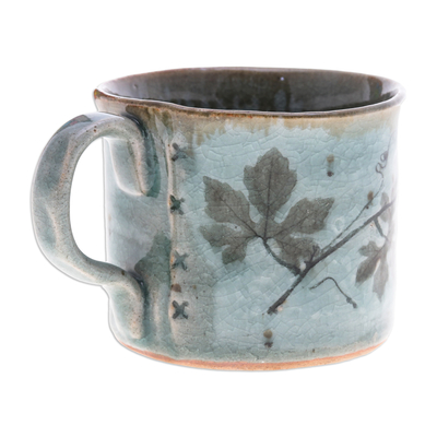 Ceramic cup, 'Thai Eden in Blue' - Crackled Finished Leafy Blue and Green Ceramic Cup