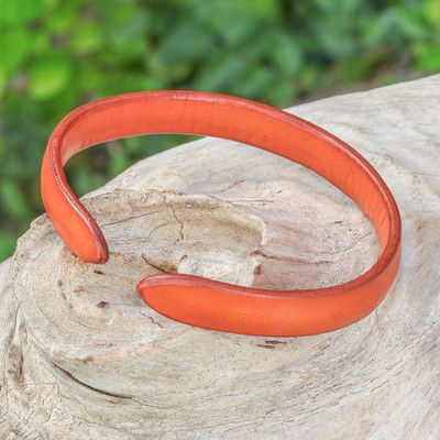 Leather cuff bracelet, 'Simply Confident' - Handcrafted Modern Leather Cuff Bracelet in Orange