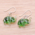 Handblown glass dangle earrings, 'Elephant Vitality' - Handblown Striped Green Glass Elephant Dangle Earrings