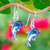 Handblown glass dangle earrings, 'Dolphin Magic' - Handblown Dolphin-Shaped Glass Dangle Earrings in Blue