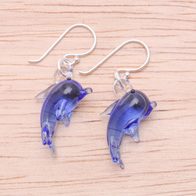 Handblown glass dangle earrings, 'Dolphin Magic' - Handblown Dolphin-Shaped Glass Dangle Earrings in Blue