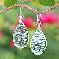 Handblown glass dangle earrings, 'Sky Blue Ovate Leaf' - Handblown Glass Dangle Earrings with Light Blue Spirals