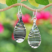 Handblown glass dangle earrings, 'Black Ovate Leaf' - Handblown Glass Dangle Earrings with Black Spirals