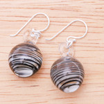 Handblown glass dangle earrings, 'Little Whirlpool' - Handblown Black Swirl Patterned Glass Dangle Earrings