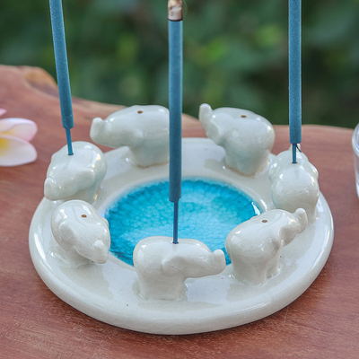 Ceramic incense holder, 'Elephant Family' - Elephant-Themed Ivory and Blue Ceramic Incense Holder