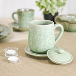 Celadon ceramic lidded cup and saucer, 'Luxury Peony in Green' - Floral Crackled Green Celadon Ceramic Covered Cup and Saucer
