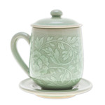 Celadon ceramic lidded cup and saucer, 'Luxury Peony in Green' - Floral Crackled Green Celadon Ceramic Covered Cup and Saucer