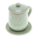 Celadon ceramic lidded cup and saucer, 'Luxury Peony in Green' - Floral Crackled Green Celadon Ceramic Covered Cup and Saucer