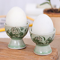 Celadon ceramic egg cups, 'Luxuriant Lotus' (pair) - Pair of Handmade Lotus Green Celadon Ceramic Egg Cups