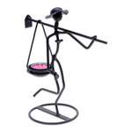 Iron tealight holder, 'On my Way' - Modern Iron Tealight Holder of Man Carrying Weight in Black