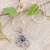 Amethyst pendant necklace, 'Crowned Beauty in Purple' - Natural Amethyst Cabochon Pendant Necklace with Floral Motif