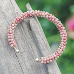 Rhodochrosite beaded cuff bracelet, 'Dainty Beauty' - Rhodochrosite Brass and Copper Wire Beaded Cuff Bracelet