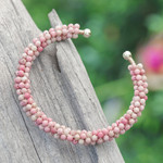 Rhodochrosite beaded cuff bracelet, 'Dainty Beauty' - Rhodochrosite Brass and Copper Wire Beaded Cuff Bracelet