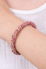 Rhodochrosite beaded cuff bracelet, 'Dainty Beauty' - Rhodochrosite Brass and Copper Wire Beaded Cuff Bracelet