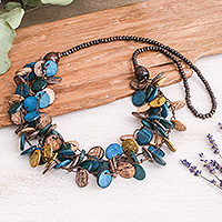Wood and coconut shell beaded strand necklace, 'Cycles of Majesty' - Teal and Golden Round Wood Beaded Three-Strand Necklace