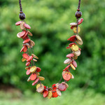 Wood and coconut shell beaded strand necklace, 'Cycles of Fire' - Red and Yellow Round Wood Beaded Three-Strand Necklace