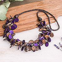 Wood and coconut shell beaded strand necklace, 'Cycles of Magic' - Purple and Brown Round Wood Beaded Three-Strand Necklace
