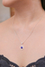 Lapis lazuli pendant necklace, 'Frozen Majesty' - High-Polished Floral Lapis Lazuli Cabochon Pendant Necklace