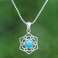 Sterling silver pendant necklace, 'Frozen Peace' - High-Polished Floral Recon Turquoise Pendant Necklace