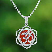 Carnelian pendant necklace, 'Sacred Fire Bloom' - Floral Om-Themed Carnelian Pendant Necklace from Thailand