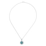 Sterling silver pendant necklace, 'Sacred Peace Bloom' - Floral Om-Themed Reconstituted Turquoise Pendant Necklace