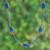 Lapis lazuli and garnet beaded long station necklace, 'Midnight Touch' - Long Station Necklace with Lapis Lazuli and Garnet Stones