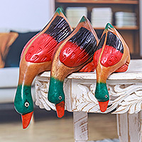 Wood sculptures, 'Duck Clan' (set of 3) - Set of 3 Hand-Carved Painted Raintree Wood Duck Sculptures