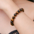 Pulsera elástica con cuentas de ojo de tigre - Pulsera elástica con cuentas de ojo de tigre hecha a mano en Tailandia