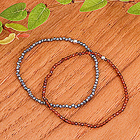 Chalcedony and hematite beaded stretch bracelets, 'Double Flair' (pair) - 2 Beaded Stretch Bracelets with Chalcedony and Hematite Gems