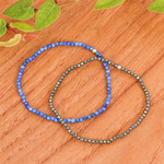 Lapis lazuli and pyrite beaded stretch bracelets, 'Double Lux' (pair) - Pair of Lapis Lazuli and Pyrite Beaded Stretch Bracelets