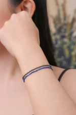 Lapis lazuli and pyrite beaded stretch bracelets, 'Double Lux' (pair) - Pair of Lapis Lazuli and Pyrite Beaded Stretch Bracelets