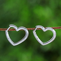 Sterling silver hoop earrings, 'Luminous Beats' - Romantic Heart-Shaped Hoop Earrings in a High Polish Finish