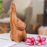 Wood figurine, 'Tiny Sweetness' - Raintree Wood Baby Elephant Figurine Hand-Carved in Thailand