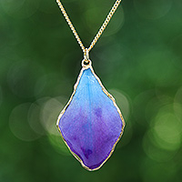 Gold-accented orchid pendant necklace, 'Oneiric Petal' - Blue and Purple Orchid 22k Gold-Accented Pendant Necklace