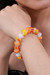 Blown glass and crystal beaded stretch bracelet, 'Vibrant Spell' - Yellow Orange Blown Glass Crystal Beaded Stretch Bracelet