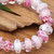 Blown glass and crystal beaded stretch bracelet, 'Sweet Spell' - Blown Glass and Crystal Beaded Stretch Bracelet in Pink Hue