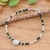 Glass beaded bracelet, 'Petals of Forest' - Floral Green Glass and Silver Beaded Bracelet from Thailand