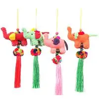 Cotton blend ornaments, 'Vibrant Parade' (set of 4) - Thai Artisan-Made 4-Piece Cotton Blend Elephant Ornament Set