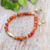 Carnelian beaded bracelet, 'Fiery Fish' - Natural Carnelian Beaded Bracelet with Brass Fish Pendant (image 2) thumbail
