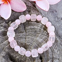 Rose quartz beaded stretch bracelet, 'Delicate Flair' - Artisan Made Stretch Bracelet with Rose Quartz Beads
