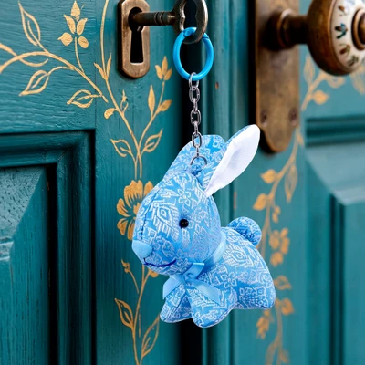 Handmade keychain, 'Delightful Hopper' - Whimsical Lanna Style-Patterned Blue White Bunny Keychain
