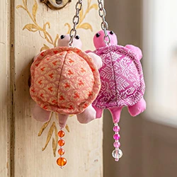 Handmade keychains, 'Shelly Leisure' (set of 2) - Set of 2 Turtle-Themed Keychains in Orange and Pink Hues