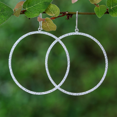 Sterling silver dangle earrings, 'Halo Hoops' - Hammered Sterling Silver Dangle Earrings with Round Pendants