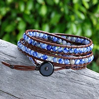 Sodalite and agate wrap bracelet, 'Indigo Melody' - Sodalite Leather Wrap Bracelet with Agate Button Closure