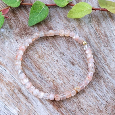 Sunstone beaded stretch bracelet, 'Solar Colors of Chiang Mai' - Natural Sunstone Beaded Stretch Bracelet with Brass Accents