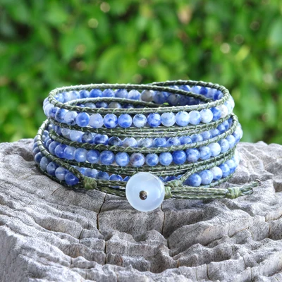 Sodalite and agate wrap bracelet, 'Liberated Winds' - Blue Sodalite and Leather Wrap Bracelet with Agate Clasp
