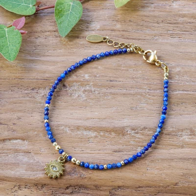 Gold-accented lapis lazuli beaded charm bracelet, 'Lapis Guardian' - Good Fortune All-Seeing Eye Lapis Lazuli Charm Bracelet